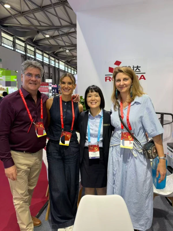 Rongda engineer demonstrates BFM1000 automatic case maker for foreign buyer at All in Print China 2026 booth